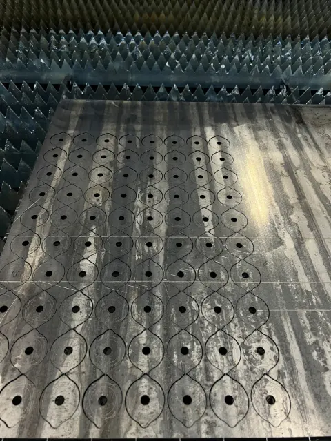LaserPron leikkaama metalliosa 19